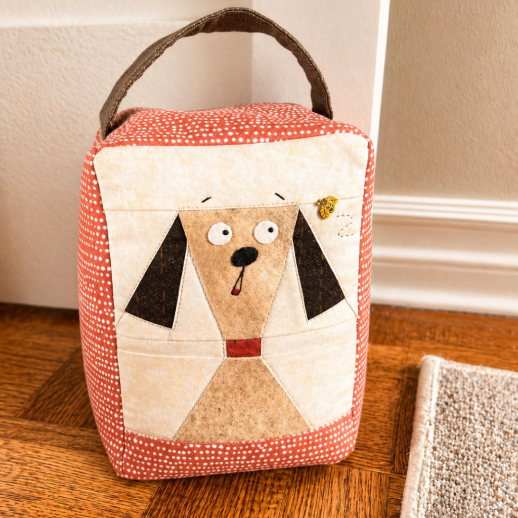 Finished Doggy on Duty geometric dog door stopper standing on a wooden floor indoors